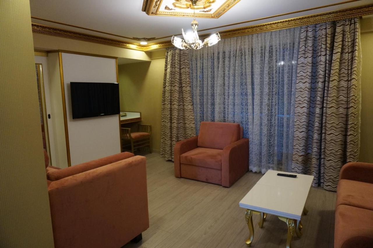 Phosphorion Hotel อิสตันบูล ภายนอก รูปภาพ A living room in a hotel
