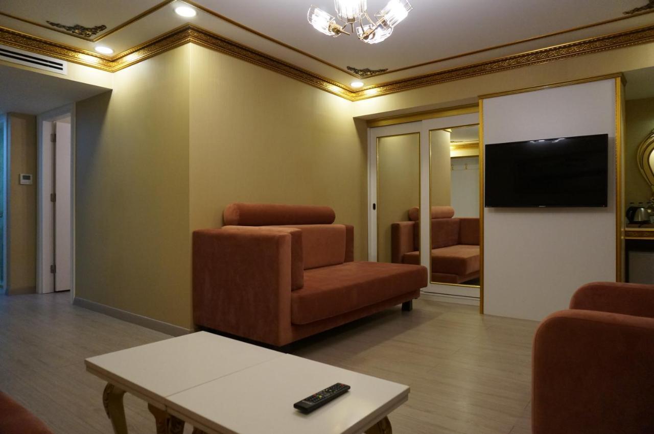 Phosphorion Hotel อิสตันบูล ภายนอก รูปภาพ A living room in a hotel